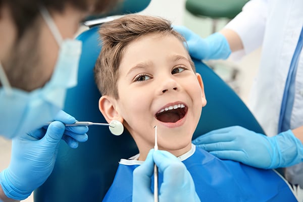 child in dentist chair